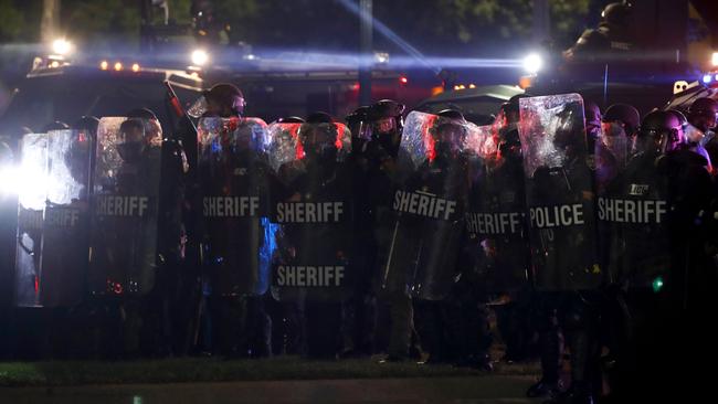 Sheriff and police in riot gear face off with protestors in Kenosha, Wisconsin. Picture: AFP