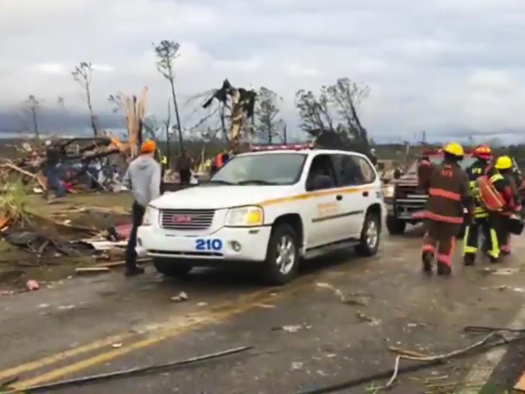 Emergency responders work in the scene amid debris in Lee County, Alabama. Picture: AP