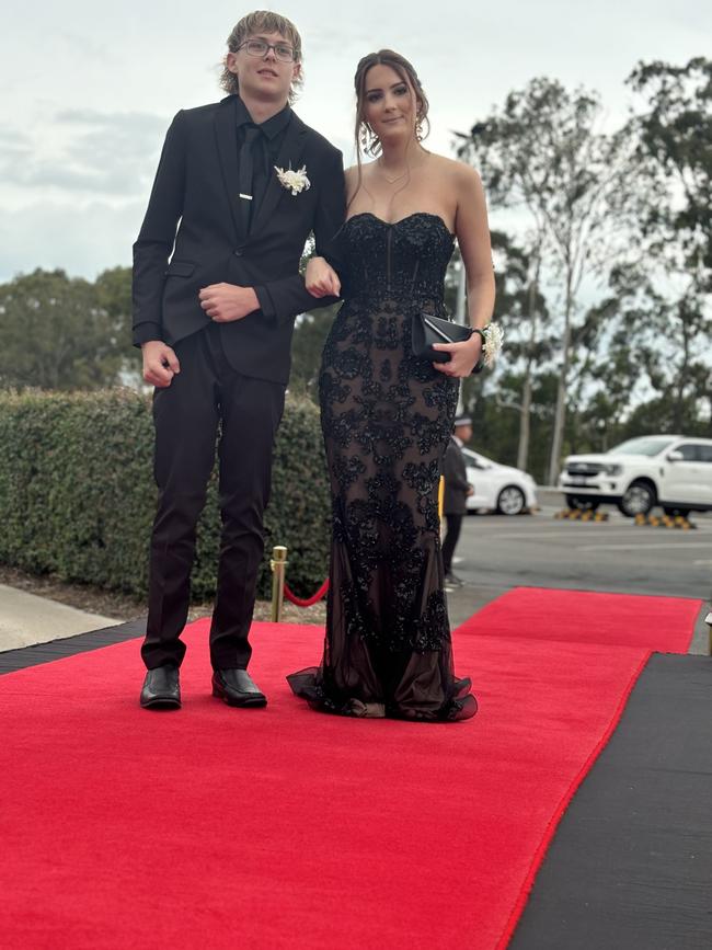 The students of Urangan State High School arriving at their formal.