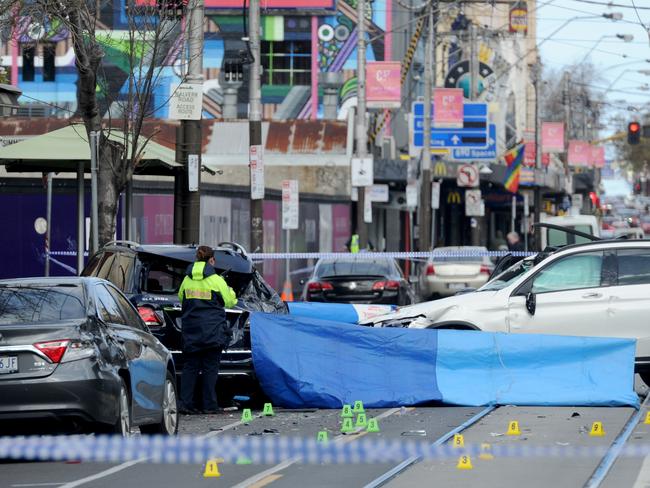 Police investigate the crash. Picture: Andrew Henshaw