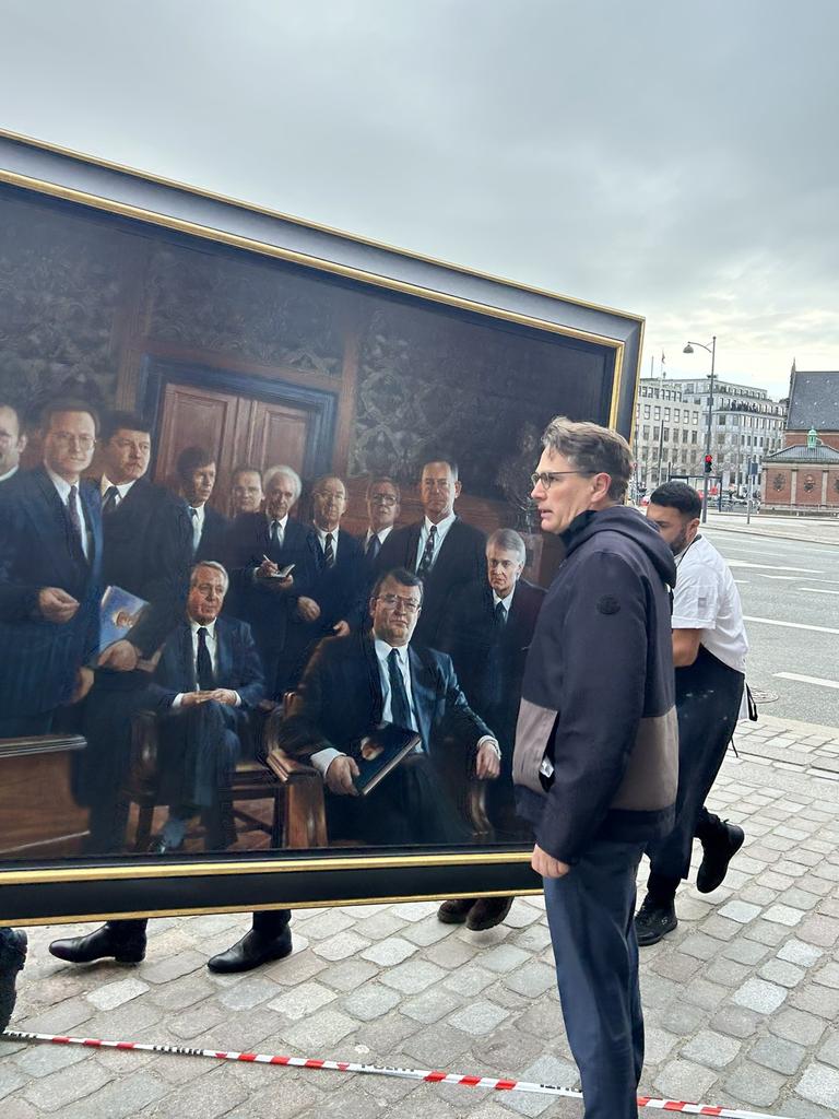 The rescue effort included the chief of the Danish National Archives Brian Mikkelsen (foreground). Picture: X/Mads Bisgaard via Storyful.