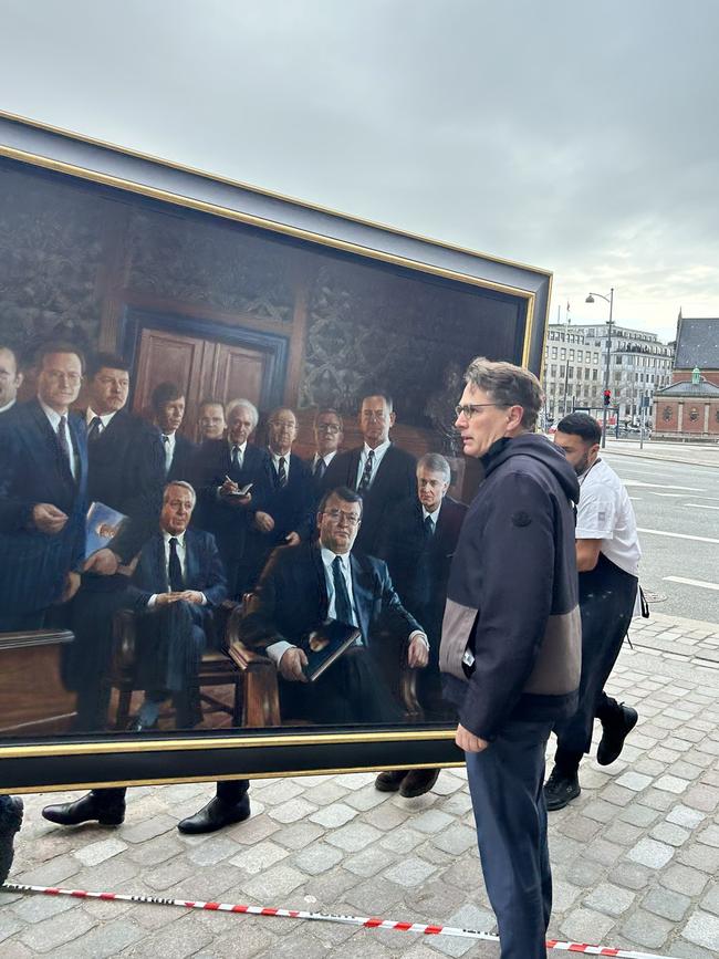 The rescue effort included the chief of the Danish National Archives Brian Mikkelsen (foreground). Picture: X/Mads Bisgaard via Storyful.