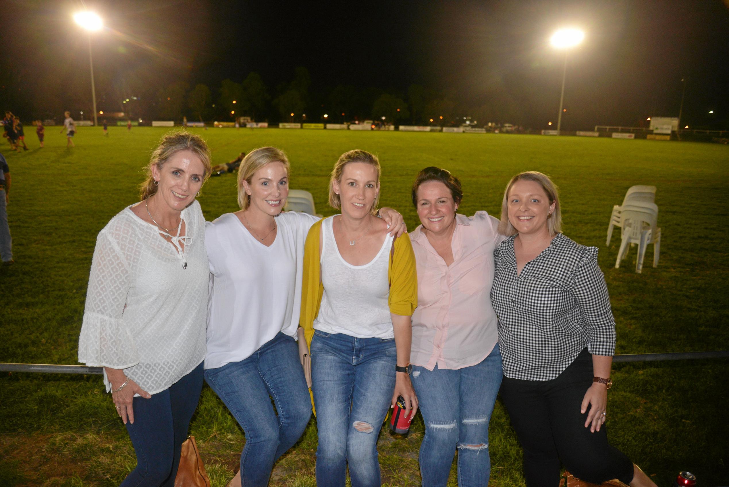 Helen Howard, Michelle Nolan, Natalie Nolan, Nat Carey and Sam Brownlie at the Cowboys home game. Picture: Gerard Walsh