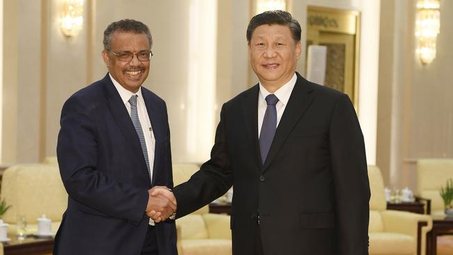 World Health Organisation director general Tedros Adhanom Ghebreyesus (left) shakes hands with Chinese President Xi Jinping before a meeting in Beijing on January 28. Picture: AFP