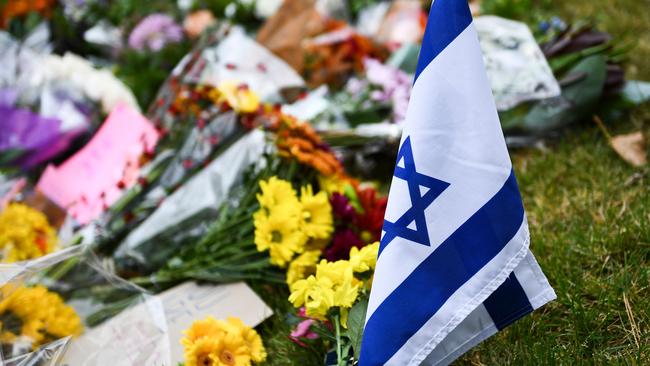 An Israeli national flag is seen at a memorial near the Tree of Life synagogue. Picture: AFP