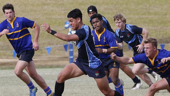 CCC's Savelio Tamale charges through the line in rugby trials earlier this year. .