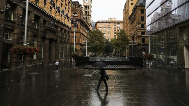 A nearly deserted Martin Place in Sydney. Australia says COVID-19 containment measures will last for six months. Picture: Dylan Robinson