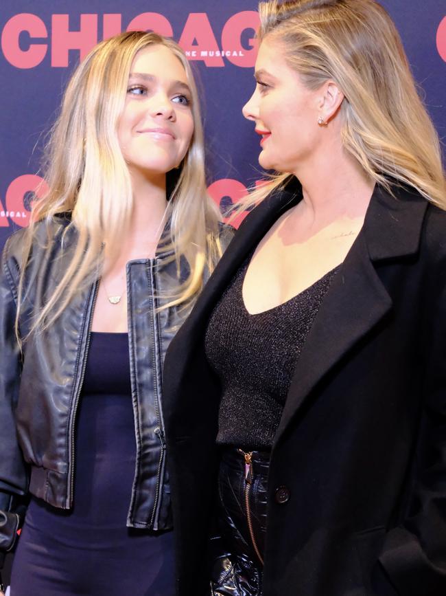 Sharing a tender moment on the red carpet. Picture: James Weir/news.com.au