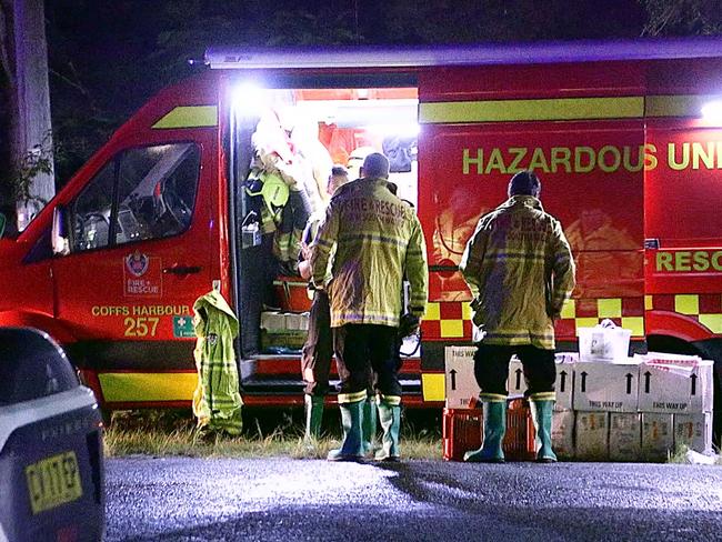 Residents are evacuated after septic tanks overflowed in the Mid North Coast town of Stuarts Point. A biohazard was declared and Fire and Rescue NSW assisted residents to a nearby youth centre for decontamination. Photo courtesy of Nine News.