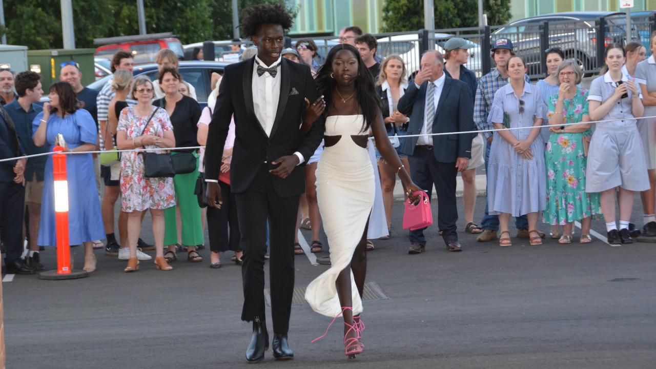 Toowoomba school formals. At the 2023 St Ursula's College formal is graduate Afeng Kag with her partner. Picture: Rhylea Millar