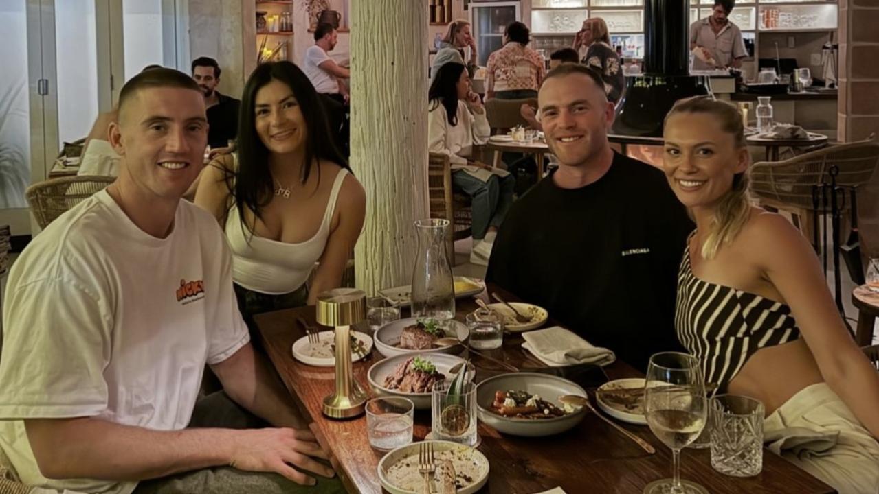 Tom Mitchell with Tayla Brown and Darcy Cameron with Adriana Guevara Paez in Byron Bay. Pic: Instagram