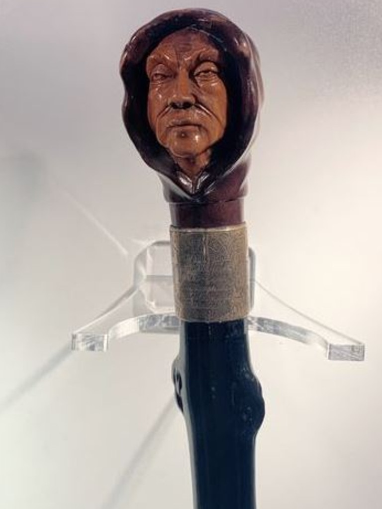 The facial composite was carved into the handle of a walking cane. Picture: College of Policing