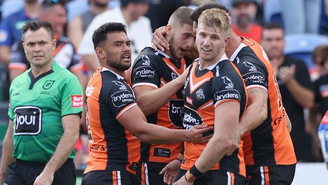 Wests Tigers celebrate a try by Adam Doueihi. Picture: Ashley Feder/Getty Images