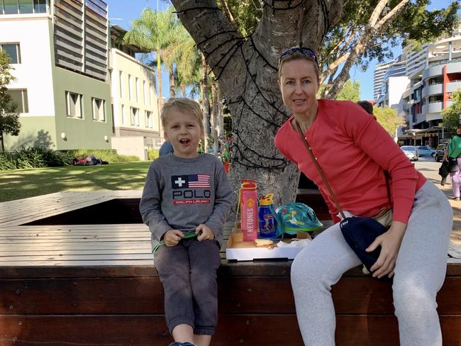 Sandra Linnemann and her four-year-old son Armin Linnemann, took advantage of being able “to get out of the house,” while they ate pizza together. Picture: Isabella Magee