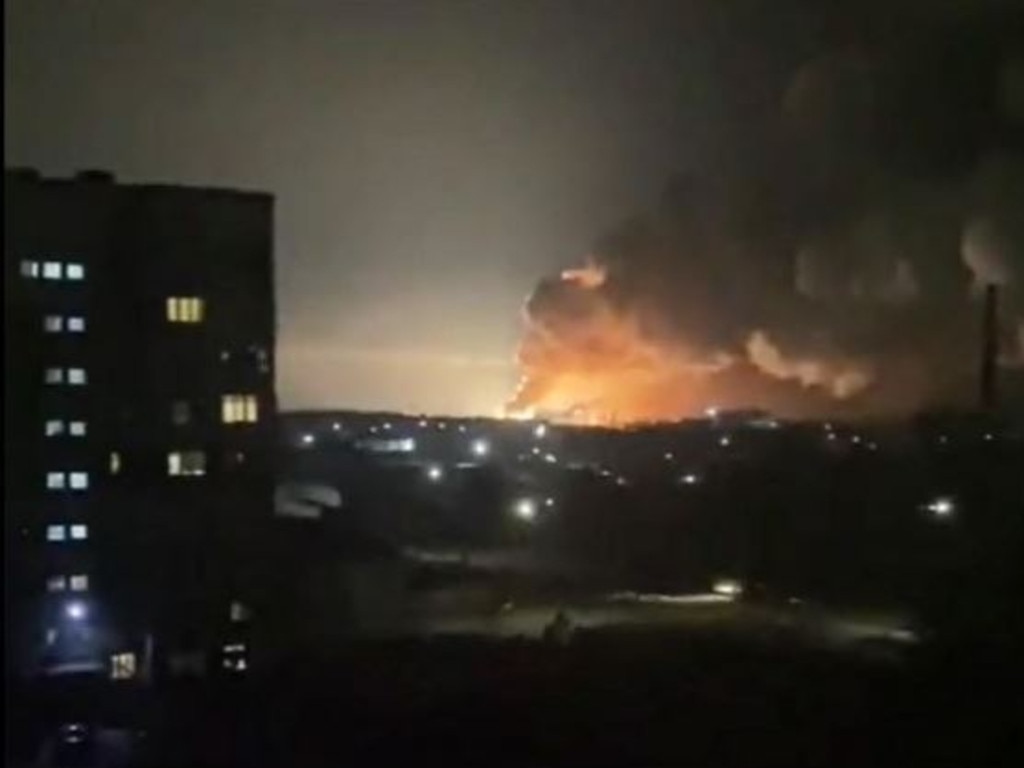 An apartment building in Kyiv ablaze after explosion. Explosions are being heard in several Ukrainian cities, including Kyiv and Kharkiv.