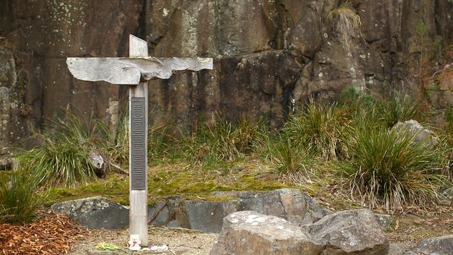 The cross bearing the names of those who lost their lives is seen in the Memorial Garden in the Port Arthur Historical Site on April 18, 2016 in Port Arthur, Australia. The tragedy transformed gun legislation in Australia, with then Prime Minister John Howard introducing the National Firearms Agreement, banning all semiautomatic rifles and all semiautomatic and pump-action shotguns and introducing stricter licensing and ownership controls. (Photo by Mark Kolbe/Getty Images)