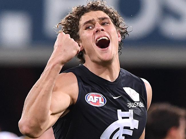 Charlie Curnow of the Blues reacts after kicking a goal during the Round 19 AFL match between the Gold Coast Suns and the Carlton Blues at Metricon Stadium at Carrara on the Gold Coast, Saturday, July 28, 2018. (AAP Image/Dave Hunt) NO ARCHIVING, EDITORIAL USE ONLY