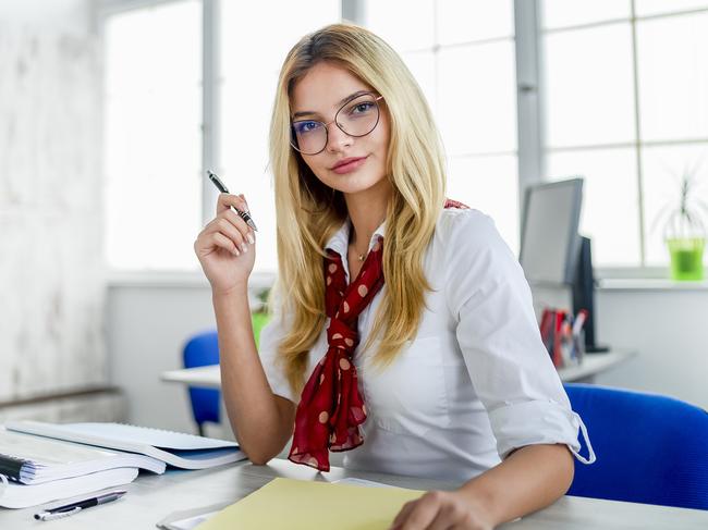 CAREERS: graduate accountants are urged to volunteer to give their resume an edge. Picture: iStockWoman at workBusinesswoman using digital tablet in office