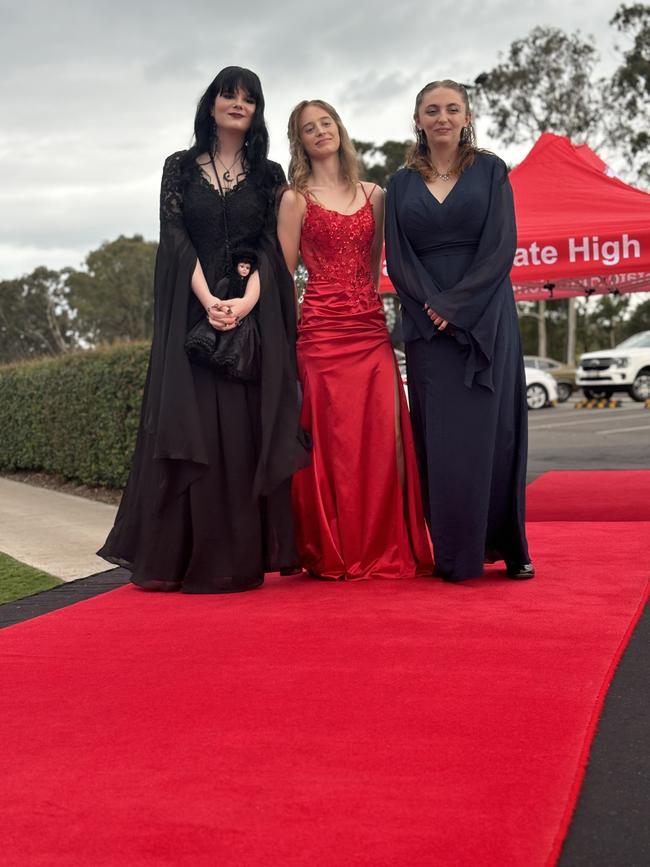 The students of Urangan State High School arriving at their formal.