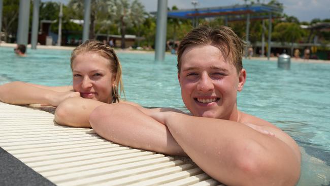 Lara Kamp and Jan Harbarth beating the heat and humidity with a cool dip at the Cairns Esplanade Lagoon. Picture: Nuno Avendano