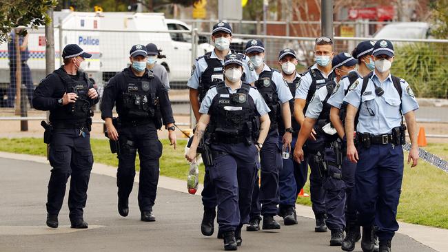 Officers hit the streets in Alexandria this morning. Picture: Sam Ruttyn