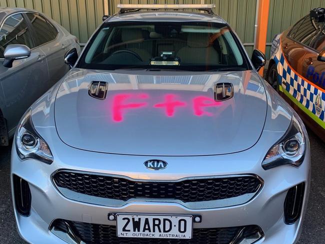 Police cars were sprayed with graffiti in Alice Springs on Friday night. Picture: NT Police Association