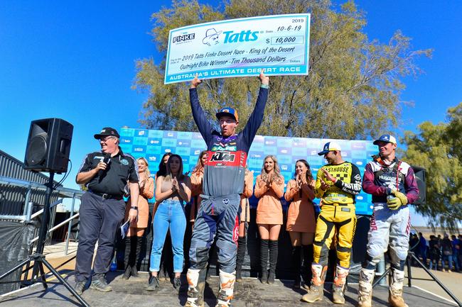 David Walsh celebrates his 2019 Tatts Finke Desert Race title. Pic: MATT HENDERSON