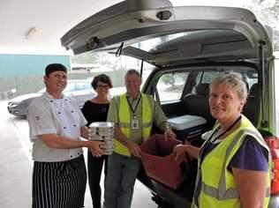 Meals on Wheels Maryborough is in desperate need of volunteer drivers like Dawn and Ken Hoare who also work in the kitchen with chef David Meier (left) and MOW co-ordinator Carly Partridge (2nd from left). Picture: Boni Holmes