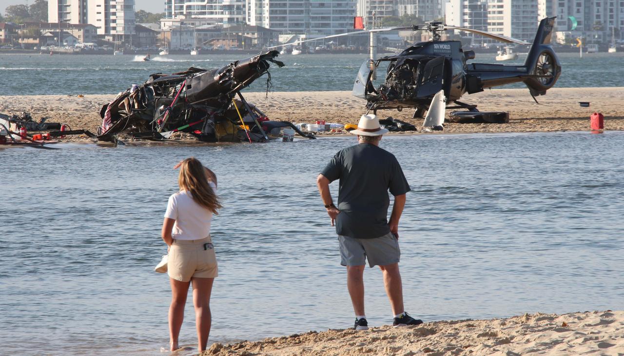 The devastating scene of a crash between two SeaWorld helicopters just outside the tourist park on the Gold Coast. Picture: Glenn Hampson