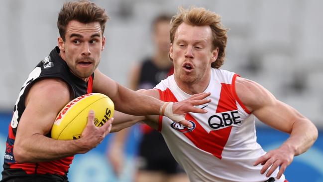 Essendon’s Will Snelling spins out of a tackle against Sydney. Picture: Michael Klein