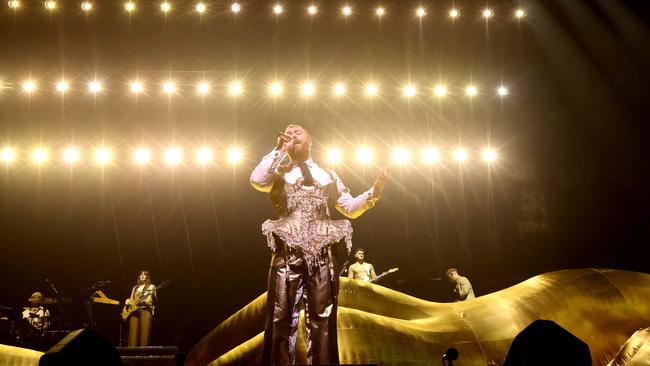 Sam Smith in front of the giant gold statue of a body reclining across the stage at the Adelaide Entertainment Centre, 28th Oct 2023 Picture: Kelly Barnes