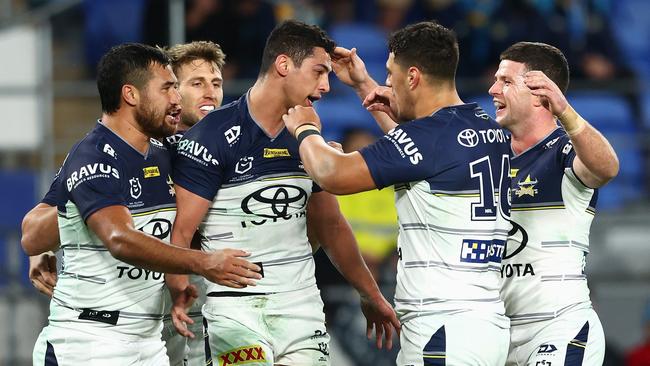 Heilum Luki celebrates a try with Cowboys teammates. Picture: Getty Images