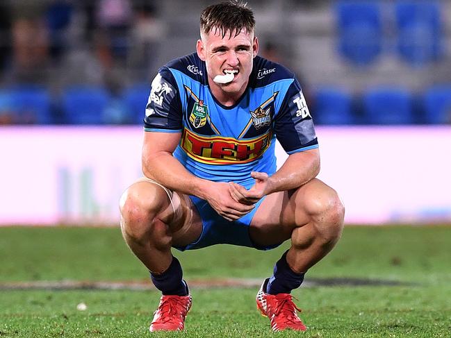 AJ Brimson of the Titans looks on at full-time during the Round 24 NRL match between the Gold Coast Titans and the Melbourne Storm at Cbus Super Stadium on the Gold Coast, Saturday, August 25, 2018. (AAP Image/Dave Hunt) NO ARCHIVING, EDITORIAL USE ONLY