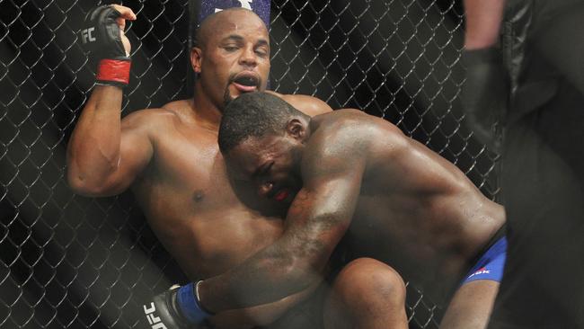Daniel Cormier, left, battles Anthony Johnson during a light heavyweight title fight at UFC 210.