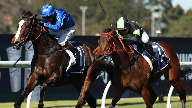 Cosmonova and Reece Jones (right) grabs Dipsy Doodle to score at Rosehill. Picture: Jeremy Ng/Getty Images