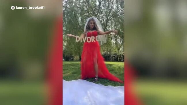 Woman burns wedding dress in viral divorce video