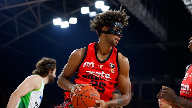 PERTH, AUSTRALIA - FEBRUARY 11: Keanu Pinder of the Wildcats grabs the rebound ball during the NBL Seeding Qualifier match between Perth Wildcats and South East Melbourne Phoenix at Perth High Performance Centre, on February 11, 2025, in Perth, Australia. (Photo by James Worsfold/Getty Images)