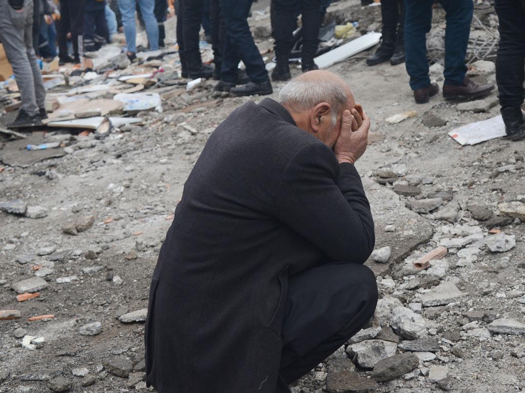 A man reacts as people search for survivors through the rubble in Diyarbakir, in Turkey. Picture: AFP