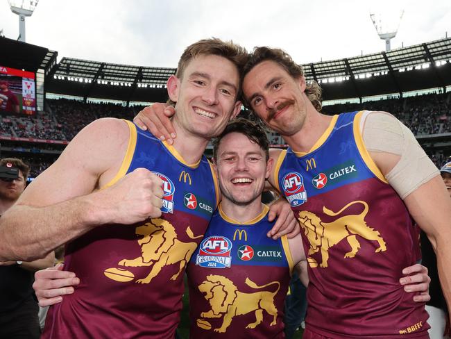 MELBOURNE , AUSTRALIA. September 28, 2024. AFL Grand Final between the Brisbane Lions and Sydney Swans at the MCG. Winning Brisbane Lions players Harris Andrews, Lachie Neale and Joe Daniher. Picture: David Caird