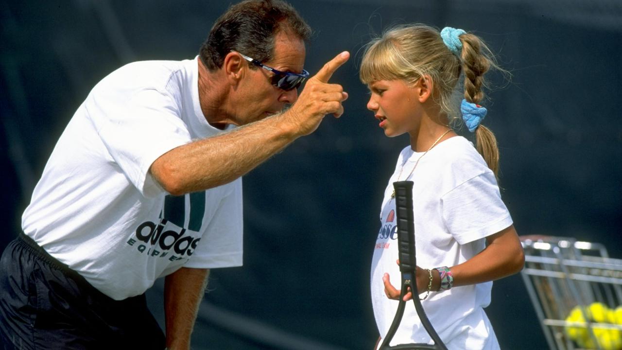 Coach Nick Bollettieri gives instructions to a young Anna Kournikova. Mandatory Credit: Simon Bruty/Allsport