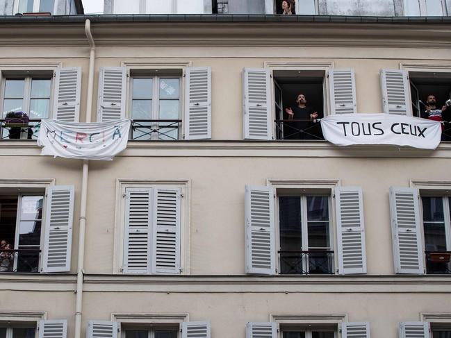 Parisians applaud to show their support to healthcare workers. Picture: AFP.