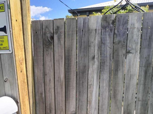 Three pinewood posts were loosely nailed together in the botched job to fix the fence.