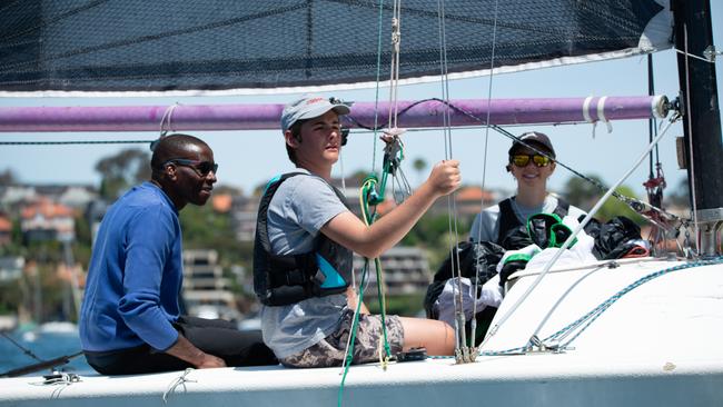 These crew members travelled from Newcastle to join the regatta. Picture: Thomas Lisson