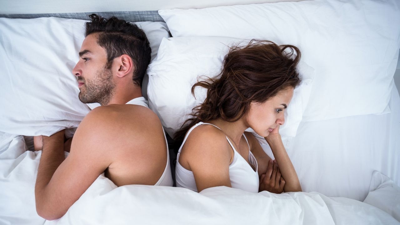 Don't let a bad night's sleep ruin your relationship with these mattresses for couples. Picture: iStock/Wavebreakmedia.