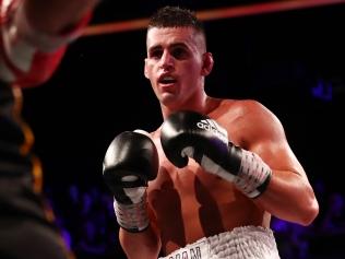 BRISBANE, AUSTRALIA - DECEMBER 04: Issac Hardman in action against Adam Stowe during the Middleweight bout at Fortitude Music Hall on December 04, 2021 in Brisbane, Australia. (Photo by Chris Hyde/Getty Images)