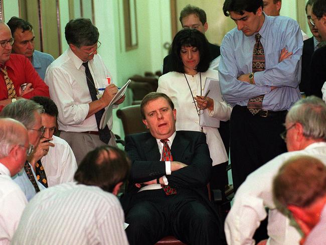 Peter Costello, surrounded by media during the budget lock-up in Canberra in 1998.