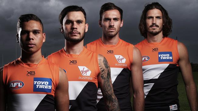 GWS Giants indigenous players Ian 'Bobby' Hill, Zac Williams and Jeremy Finlayson with captain Phil Davis make a stance against the recent racial vilification against West Coast player Liam Ryan. Picture: Phil Hillyard