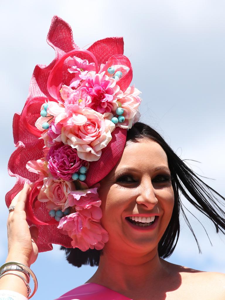 Fashions on the Field Best Headwear winner Trinity Collison during Melbourne Cup Day at The Gold Coast Turf Club. Photograph: Jason O’Brien.