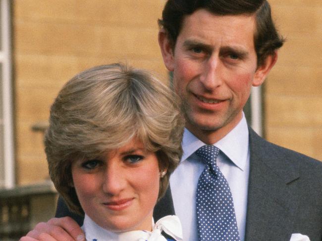 GREAT BRITAIN - FEBRUARY 24: Lady Diana Spencer (later to become Princess of Wales) reveals her sapphire and diamond engagement ring while she and Prince Charles, Prince of Wales pose for photographs in the grounds of Buckingham Palace following the announcement of their engagement (Photo by Tim Graham Photo Library via Getty Images)