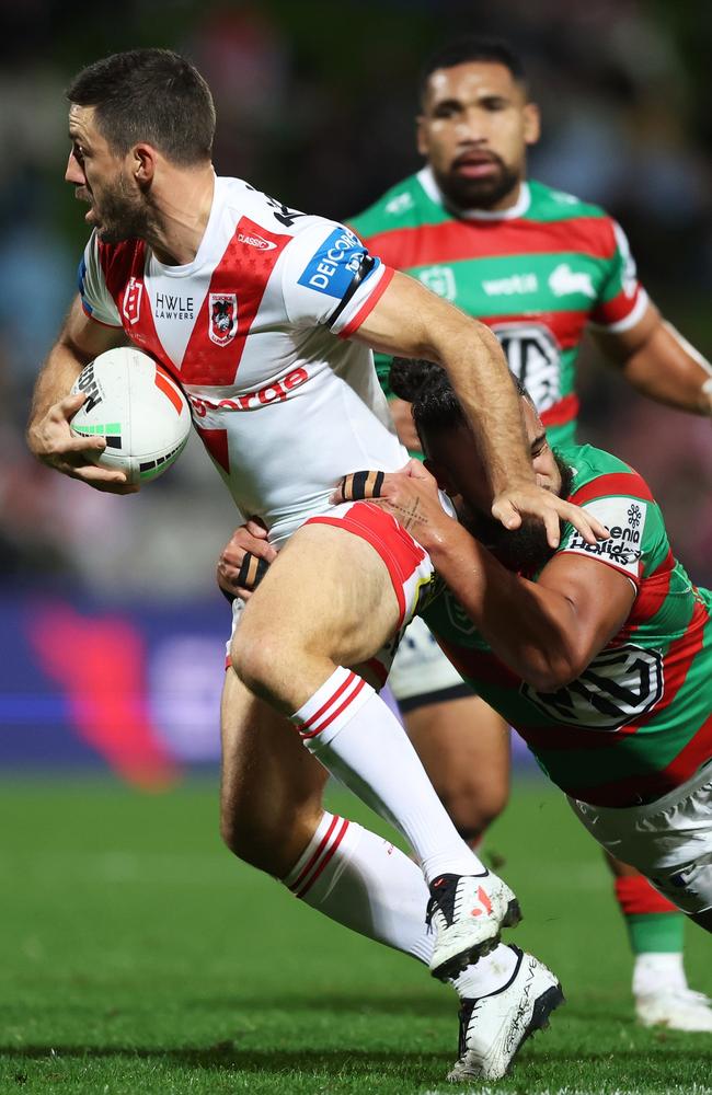 Ben Hunt of the Dragons is tackled. (Photo by Mark Metcalfe/Getty Images)